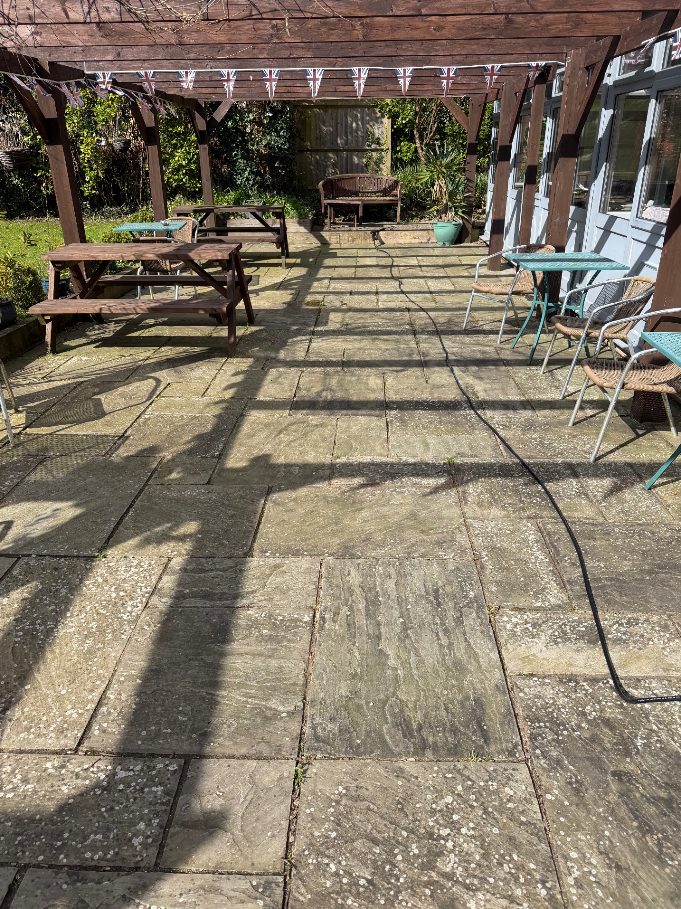 Indian sandstone patio before cleaning