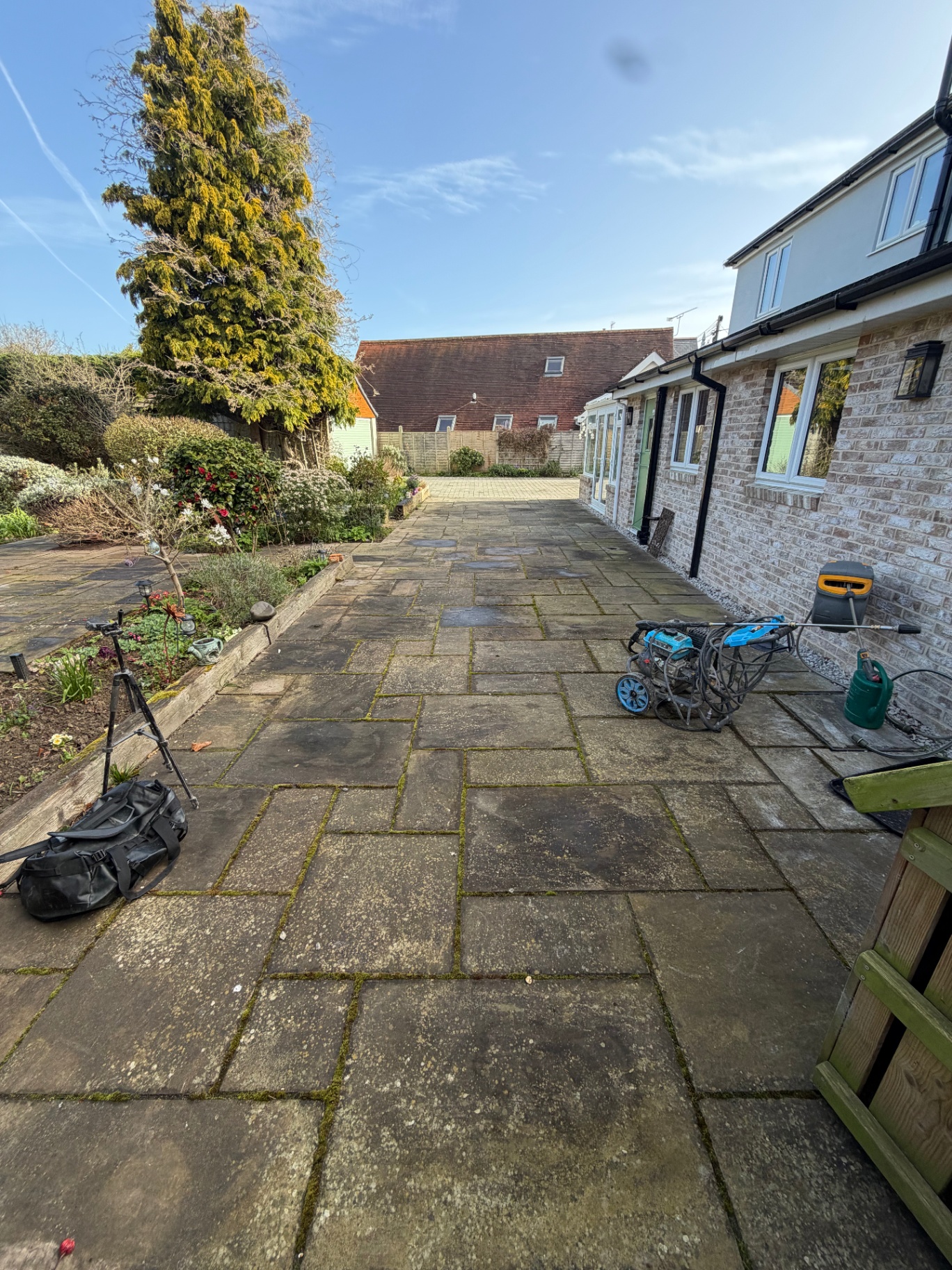 Long sandstone patio before cleaning